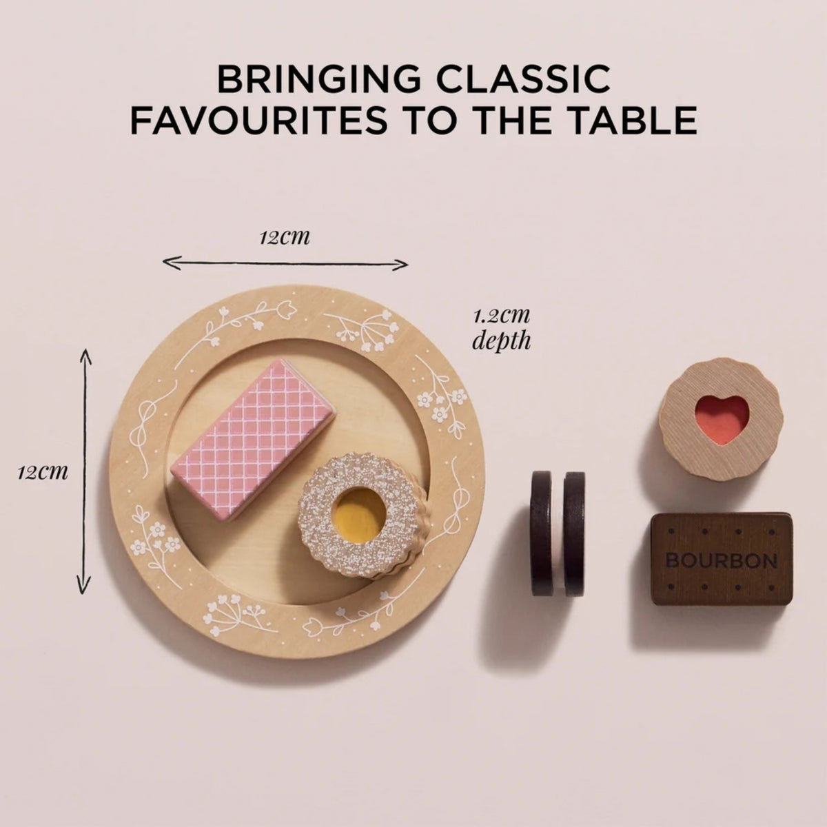 A wooden toy serving plate with printed floral details, shown with miniature biscuits on top. The image includes dimension labels indicating 12cm width and 12cm depth, plus text reading 'BRINGING CLASSIC FAVOURITES TO THE TABLE.