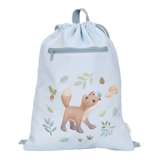 A blue gym bag with a drawstring closure, featuring a playful fox and forest imagery, including leaves and acorns.