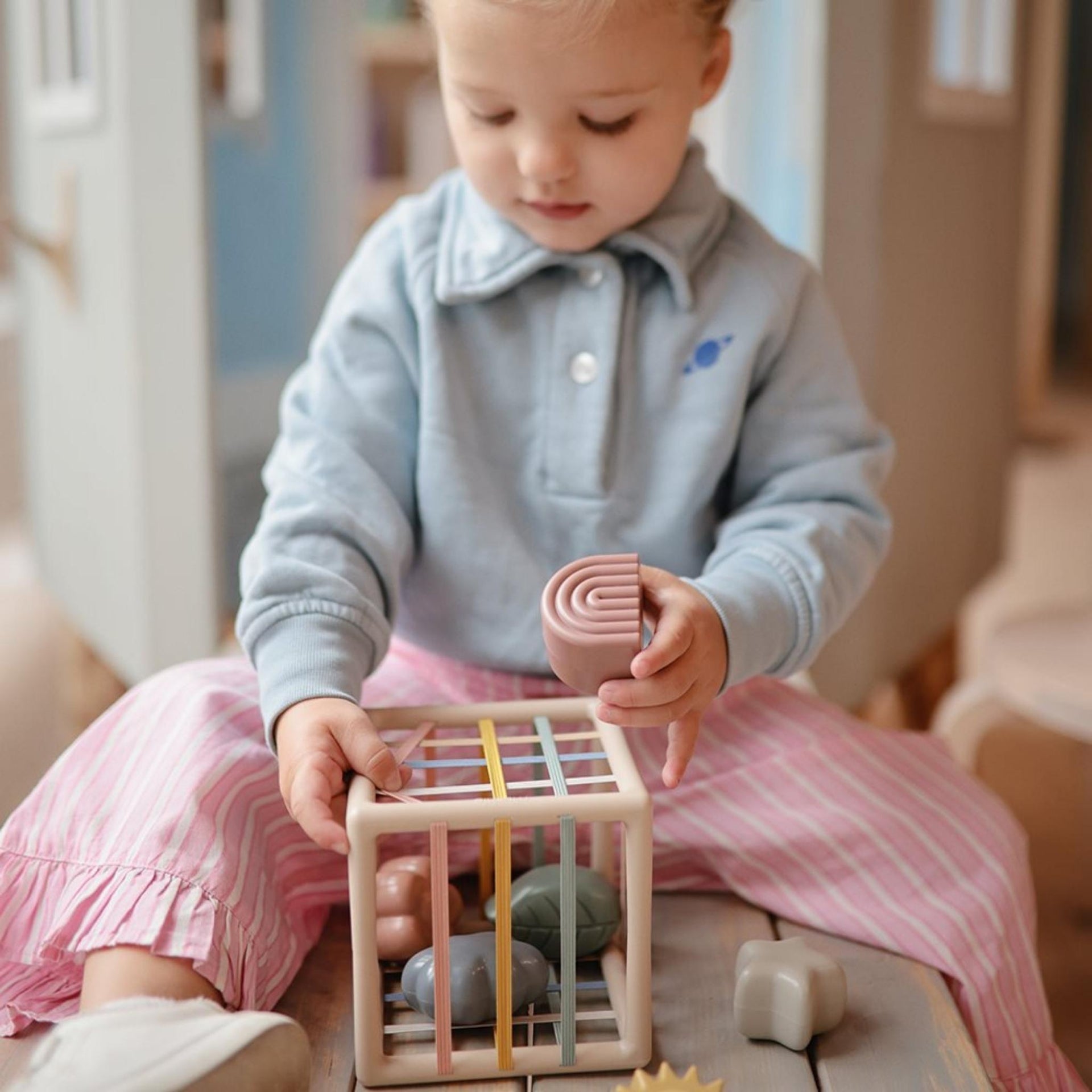 Mushie Elastic Shape Sorter