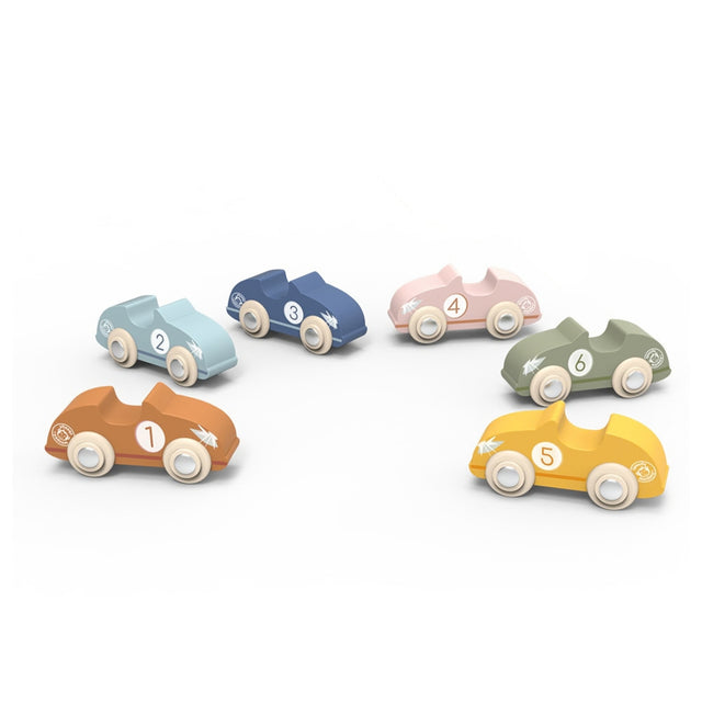 Six small wooden race cars in pastel colors arranged on a clean white background. The cars are orange, light blue, dark blue, pink, green, and yellow, each with a white number printed on the side.