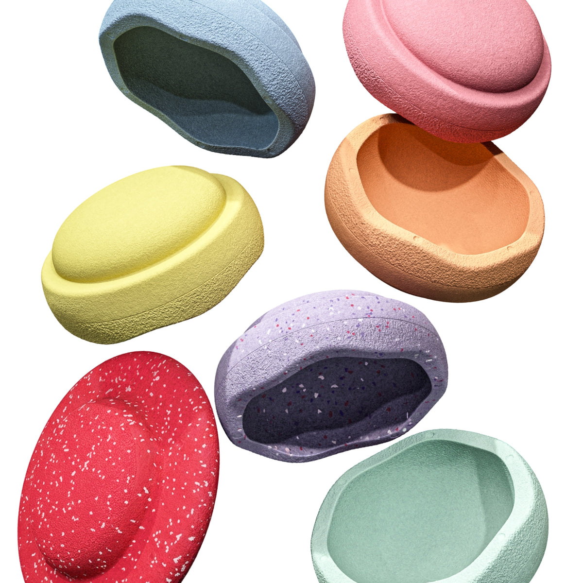 Seven textured, Original Stapelstein pieces in assorted pastel colors, including blue, pink, yellow, peach, red, purple, and mint green, falling in mid  air on a solid white background.