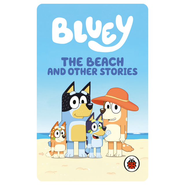 Bluey: The Beach and Other Stories card featuring the Bluey family on a sandy beach with a light blue sky background and the Bluey logo at the top.